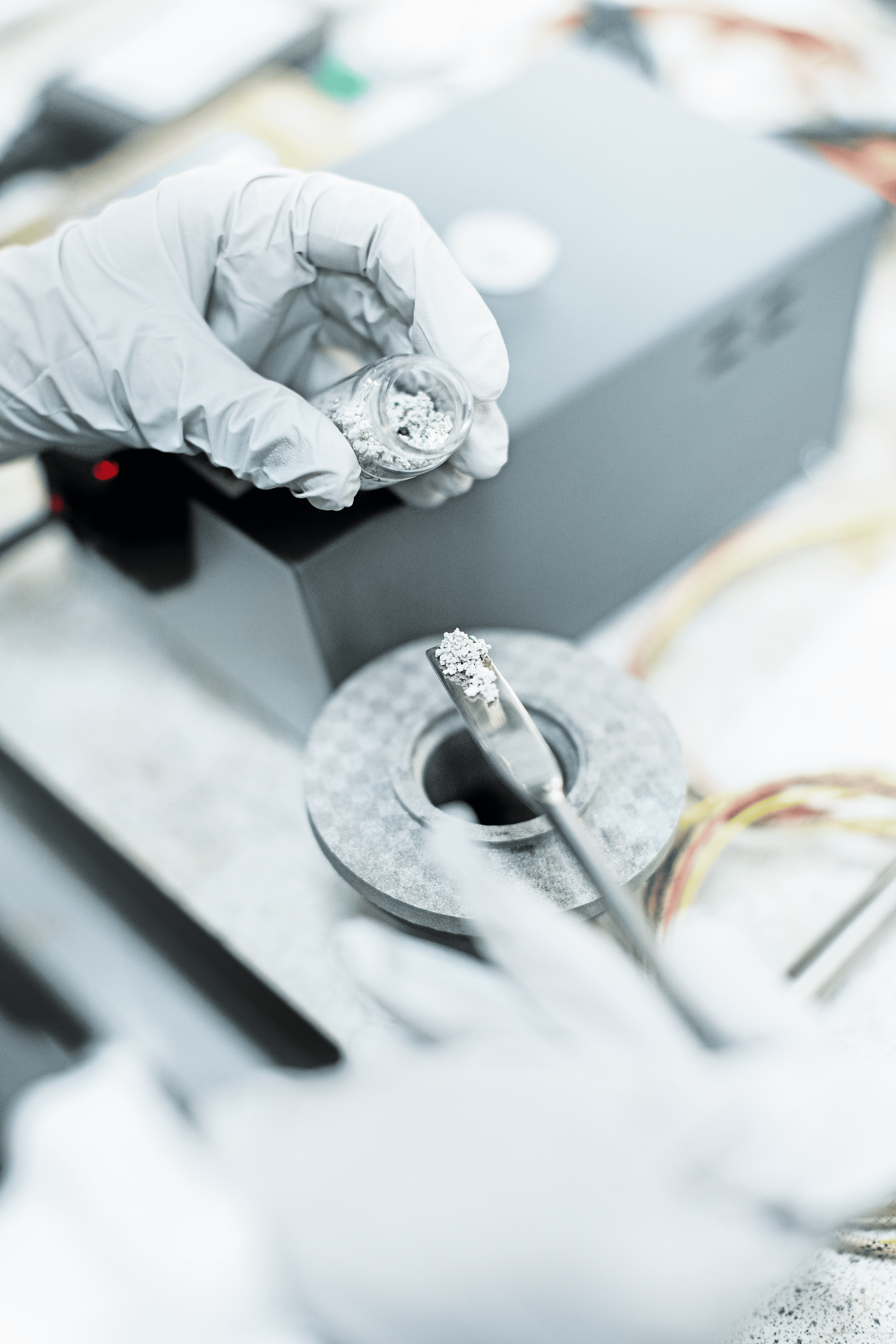 Scientist testing adhesive samples